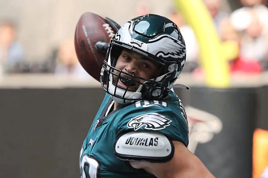 Dallas Goedert Philadelphia Eagles catching football mid-action vibrant green uniform wallpaper