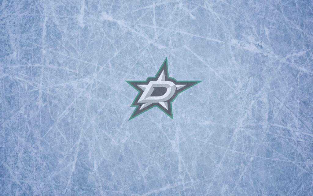 Dallas Stars logo on textured icy blue background captures frozen hockey rink energy wallpaper