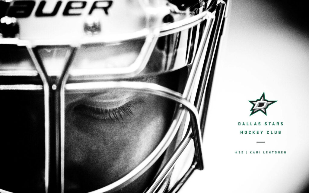 Dallas Stars player close-up grayscale wallpaper detailed helmet focused intense expression