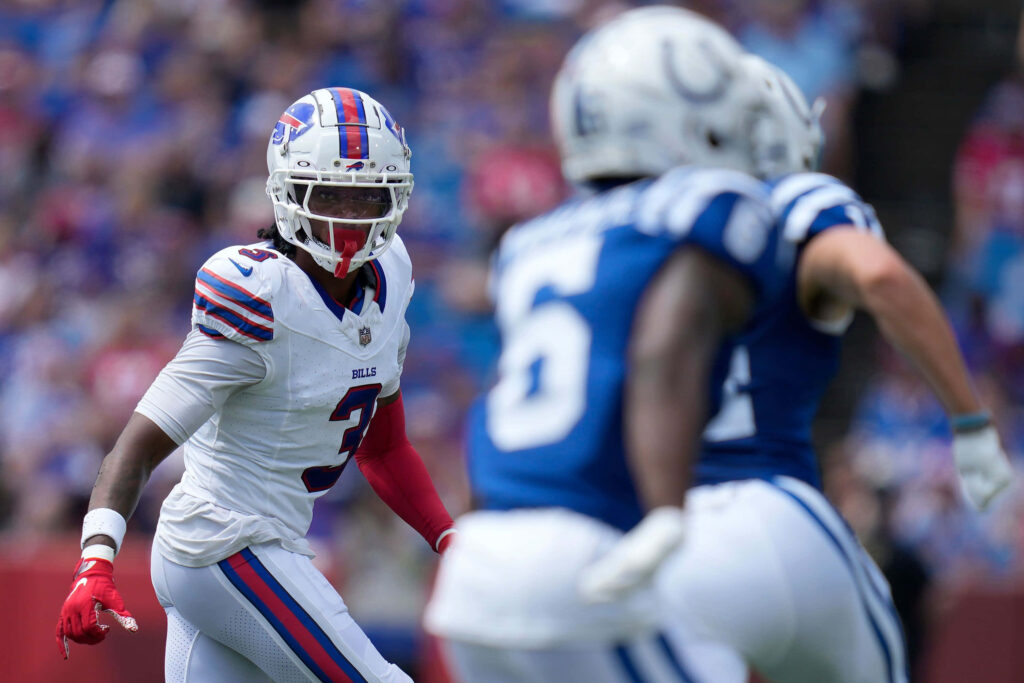 Damar Hamlin Buffalo Bills in white red uniform ready for action intense football game wallpaper