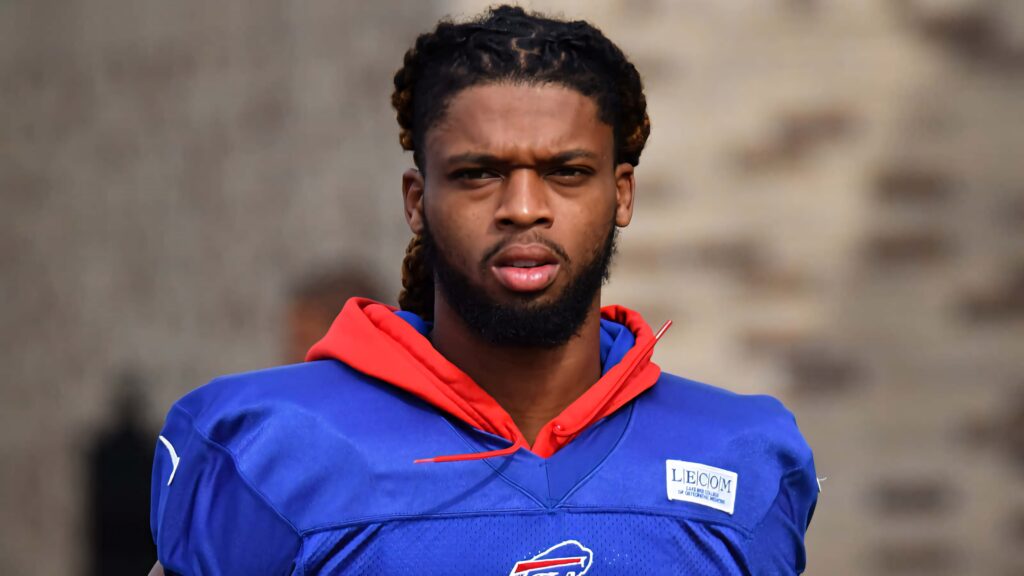 Damar Hamlin football portrait high resolution focused gaze detailed jersey natural lighting wallpaper