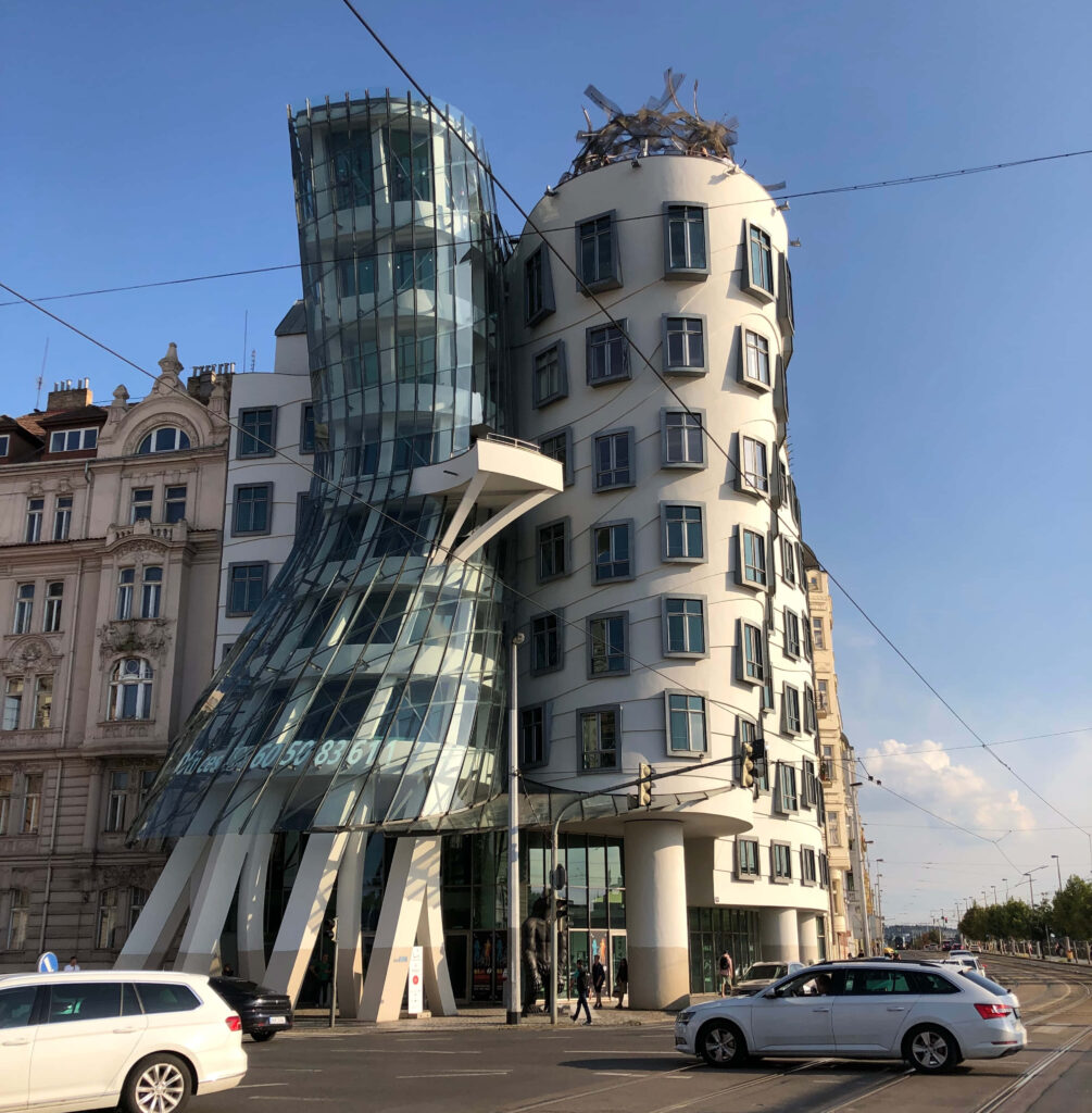 Dancing House Prague wallpaper showing unique glass concrete curves and modern architecture