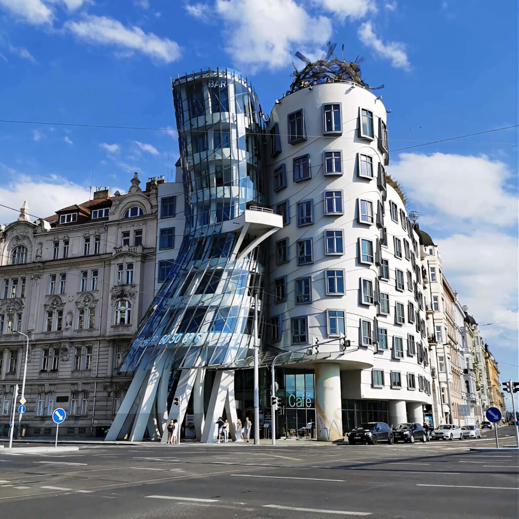 Dancing House Prague vibrant wallpaper modern curved glass concrete architecture bright sky