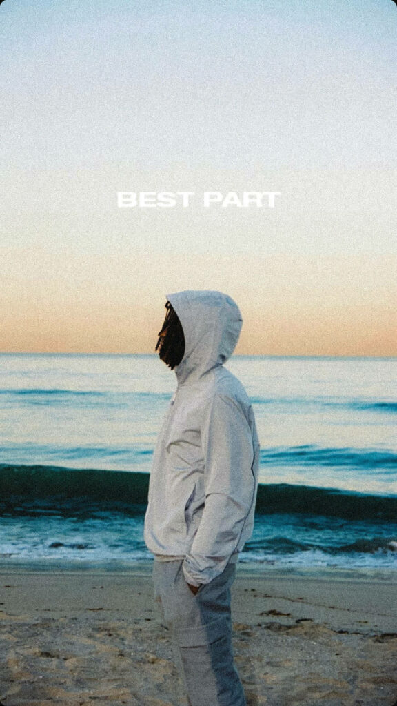 Daniel Caesar wallpaper profile on sunset beach serene pastel sky waves BEST PART text background