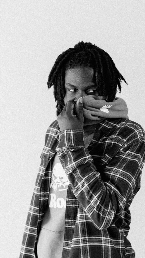 Daniel Caesar black and white wallpaper moody portrait plaid shirt hoodie minimalist background