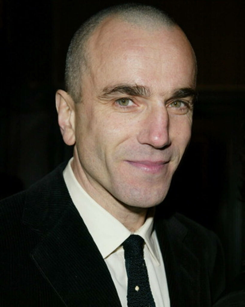 Daniel Day-Lewis in dark suit and tie with clean-shaven look and confident expression wallpaper