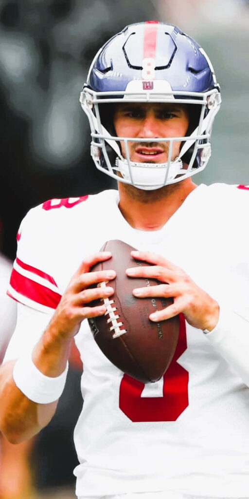 Daniel Jones New York Giants quarterback in white red uniform ready to throw football wallpaper