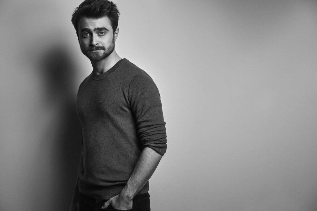 Daniel Radcliffe black and white portrait wallpaper with dramatic lighting and thoughtful expression