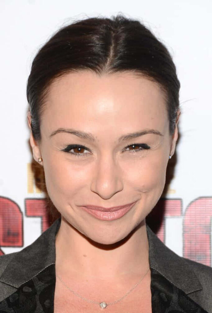 Danielle Harris natural look confident smile soft red text background high resolution portrait Wallpaper