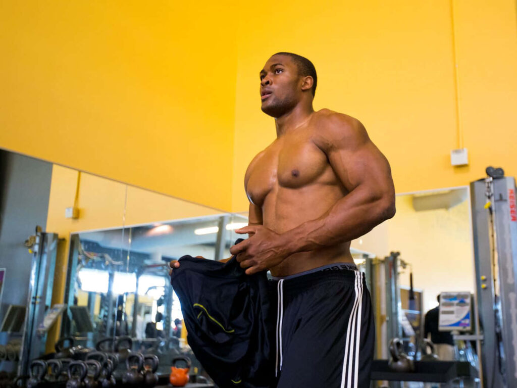 Danielle Hunter LSU Football 2015 intense gym workout showcasing strength focus and athleticism Wallpaper