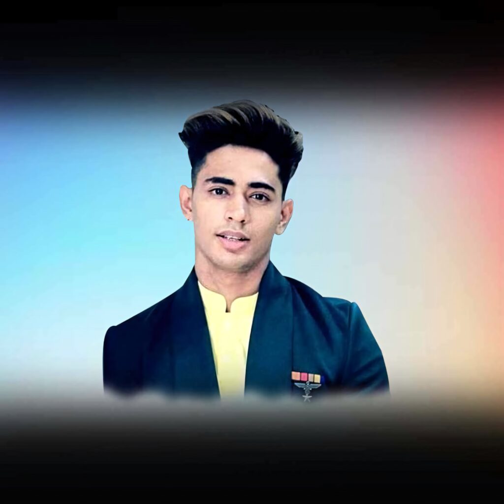 Danish Zehen in sharp suit with bright yellow shirt against blue yellow pink gradient background wallpaper
