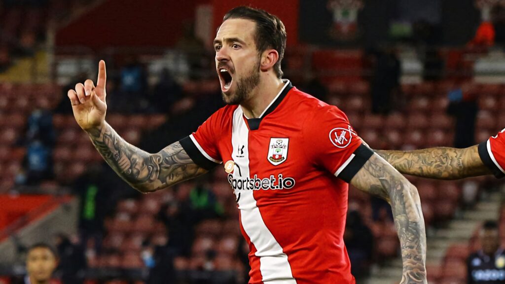 Danny Ings shouting and pointing passionately in Southampton red white kit during football match Wallpaper