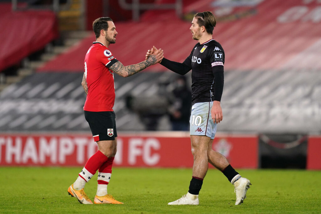 Danny Ings and Jack Grealish handshake on pitch showing Premier League sportsmanship and team colors Wallpaper