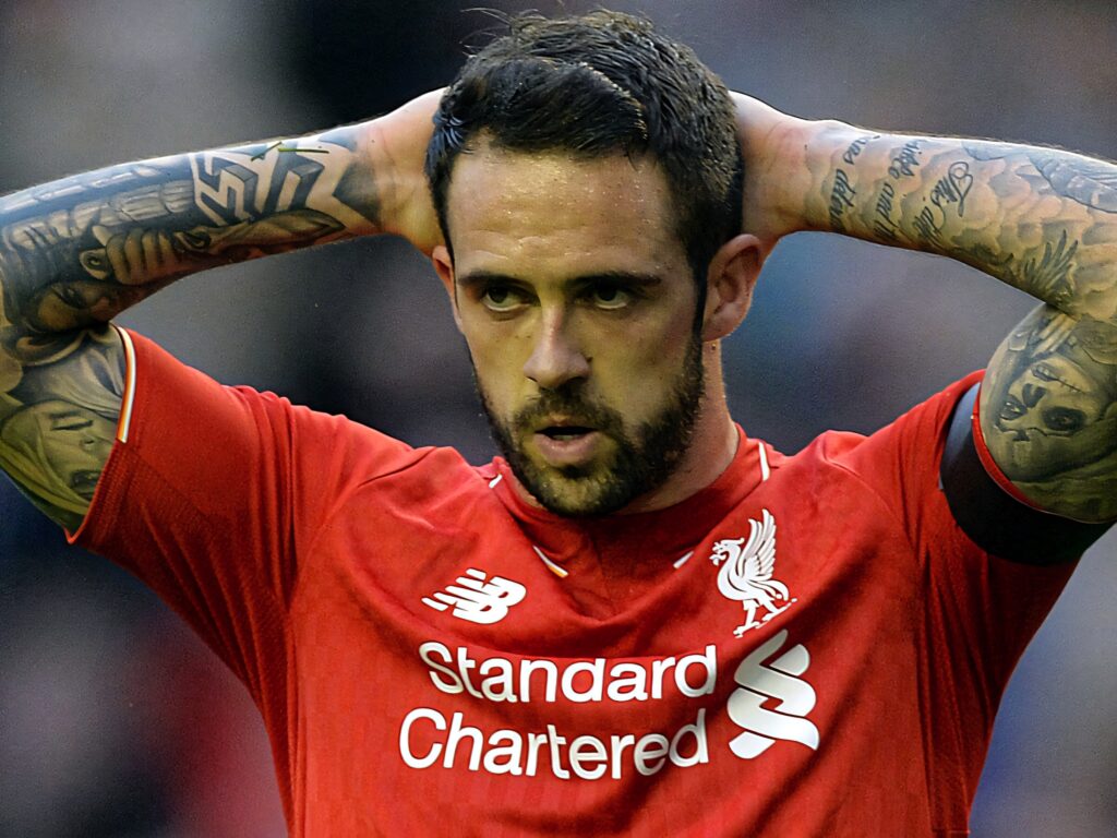 Danny Ings in Liverpool kit with focused expression and tattooed arms during football match wallpaper