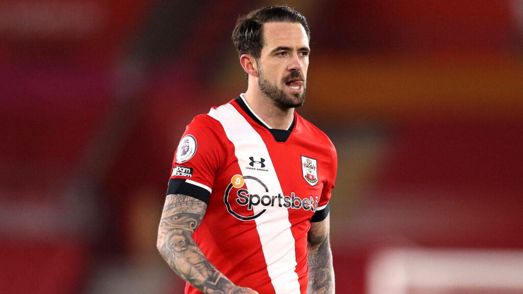 Danny Ings in Southampton FC kit focused mid-game with tattoos vibrant red white high-definition wallpaper