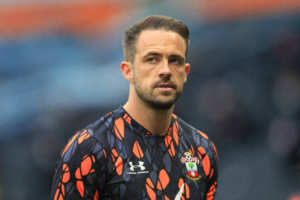 Danny Ings in bold orange navy Southampton jersey with abstract pattern modern athletic wallpaper