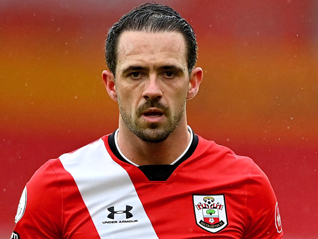 Danny Ings in Southampton kit intense focus vibrant red background high resolution football portrait Wallpaper