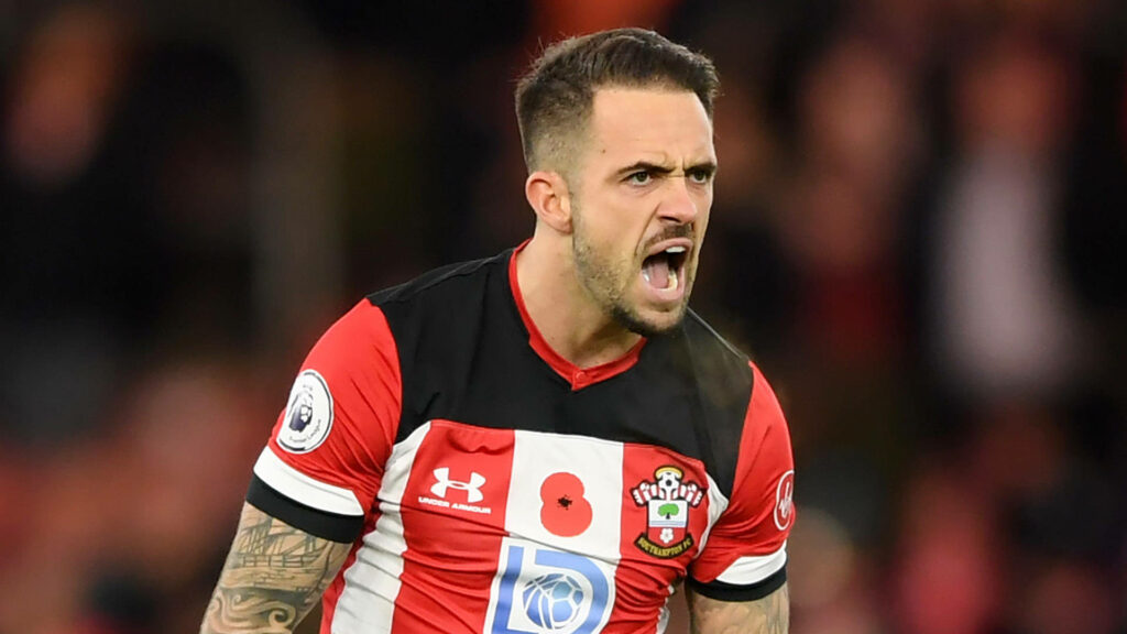 Danny Ings in Southampton kit passionately shouting during intense football match wallpaper background