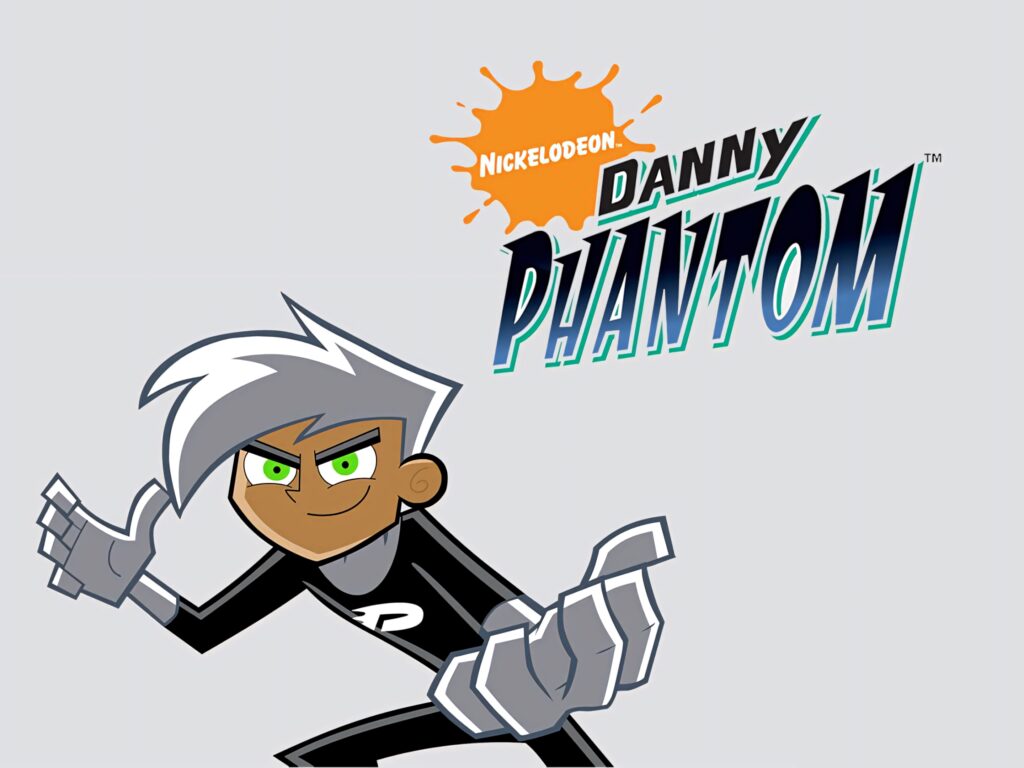 Danny Phantom smiling in black and white ghost suit with green eyes and Nickelodeon logo wallpaper