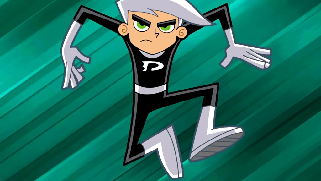 Danny Phantom ghost form jumping mid-air with white hair black suit and green action background Wallpaper