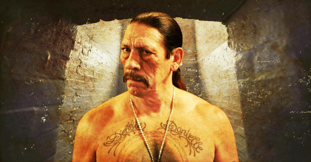 Danny Trejo intense expression in underground tunnel with textured brick walls cinematic wallpaper