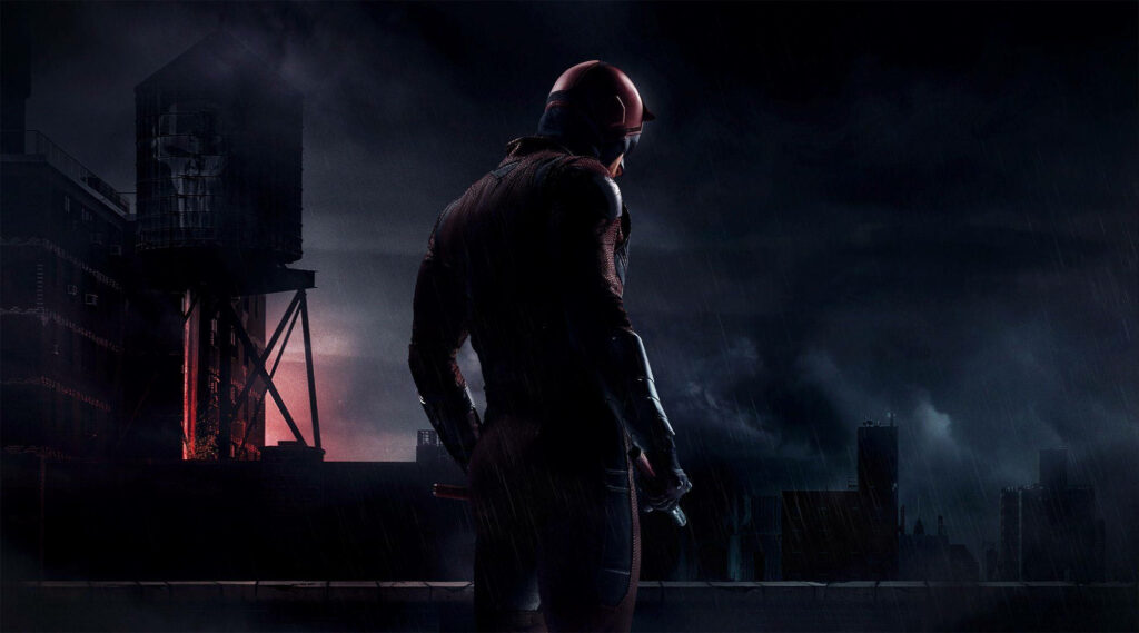 Daredevil on Rooftop in Hell's Kitchen: Rainy Night Wallpaper