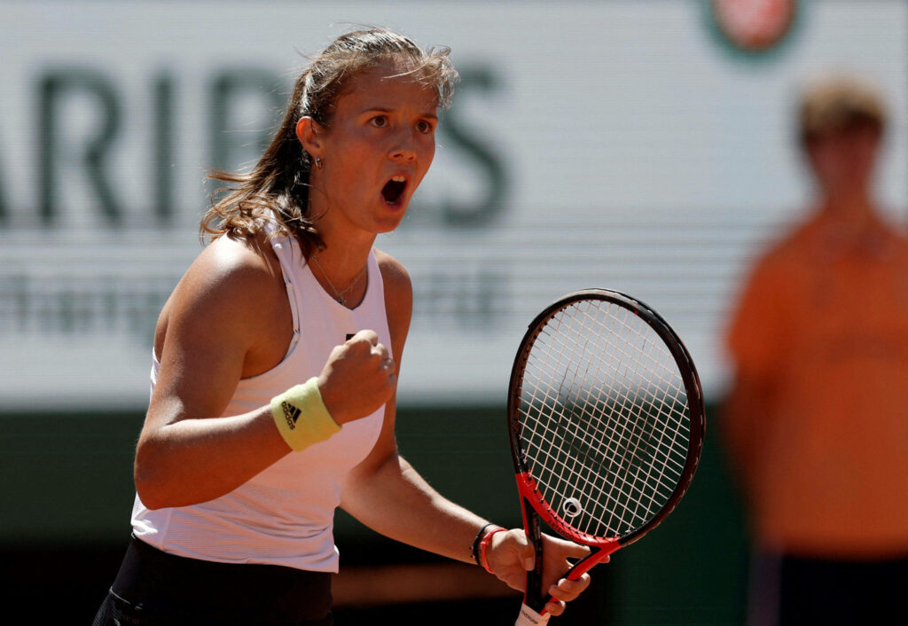 Daria Kasatkina triumphant tennis player celebrating intense energy vivid competitive sports wallpaper