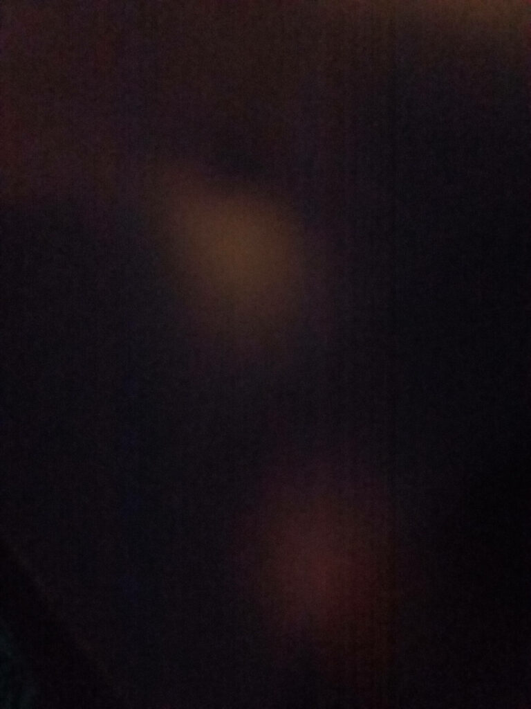 Intriguing Dark Abstract Phone Wallpaper with Subtle Stained Effect