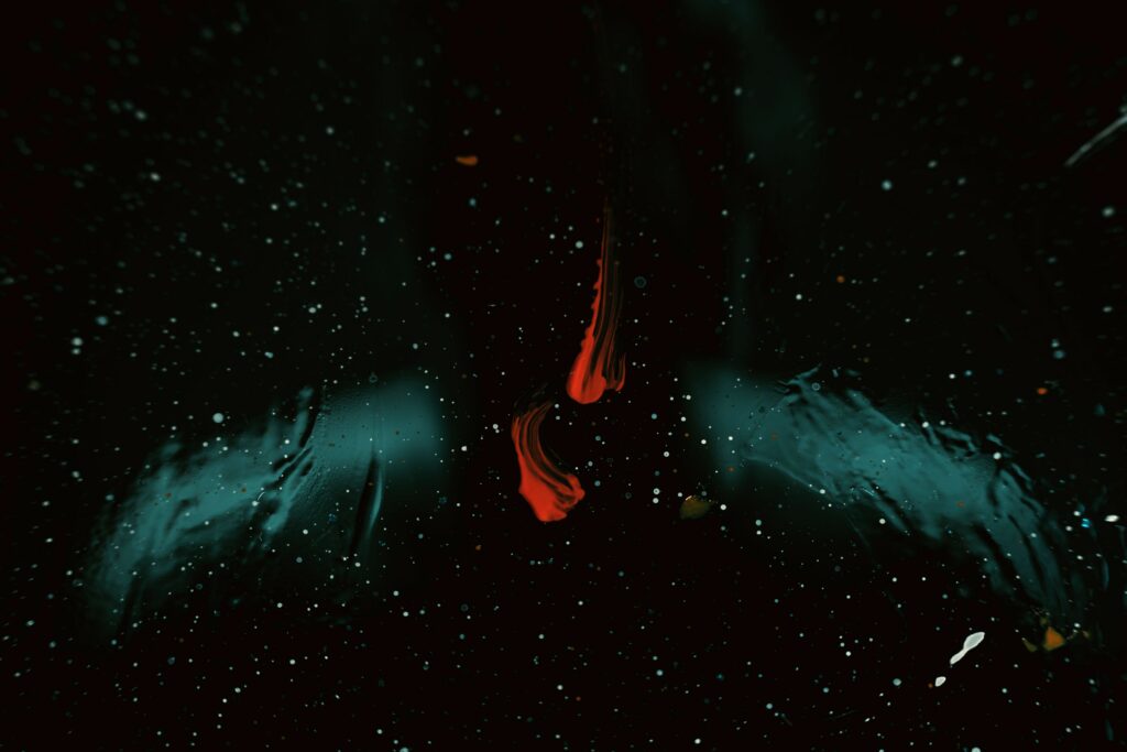 Vivid Dark Abstract Wallpaper with Paint Splatters & Bold Streaks