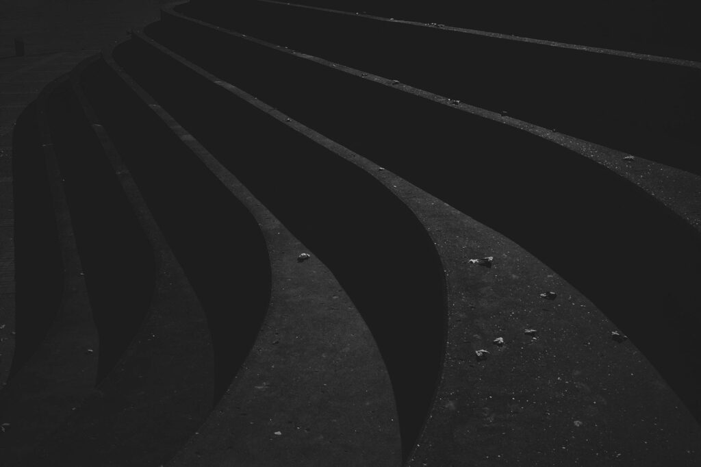 Dark Abstract Wallpaper with Blade-Like Shapes - Mysterious Background