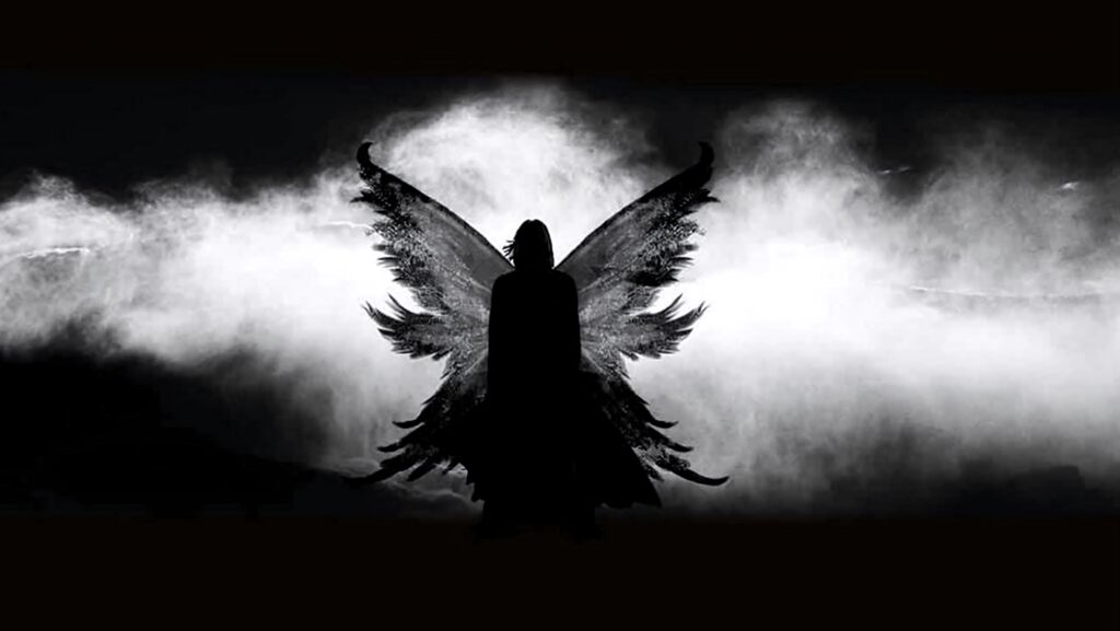 Dark angel silhouette with intricate wings in swirling fog and shadows gothic fantasy wallpaper