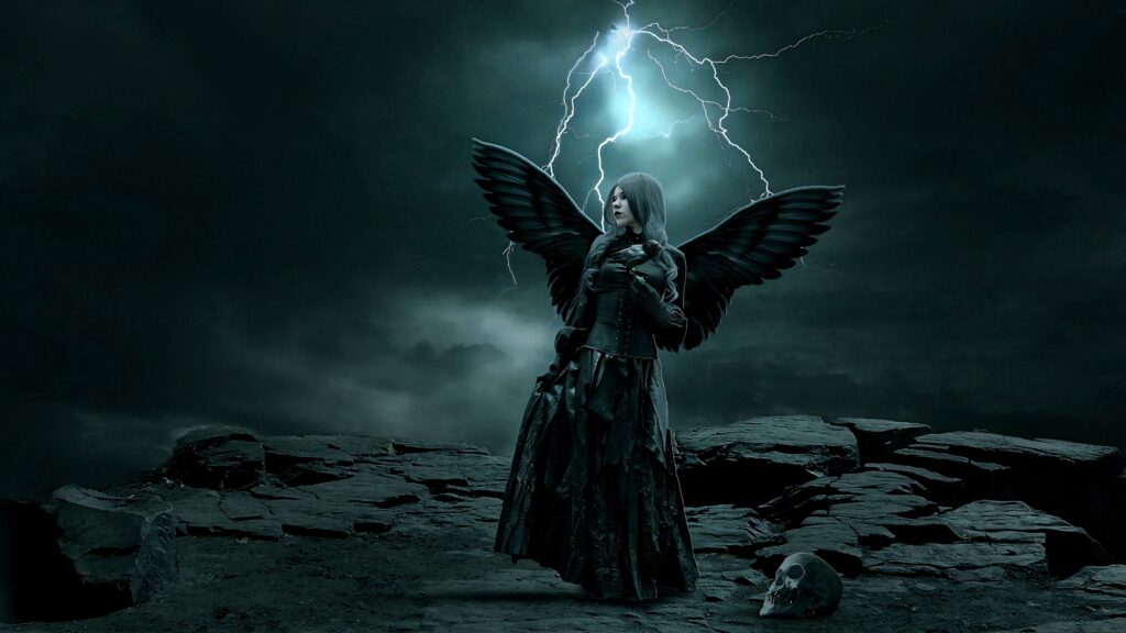 Dark angel with shadowy wings stands on rocky terrain under stormy lightning night sky wallpaper