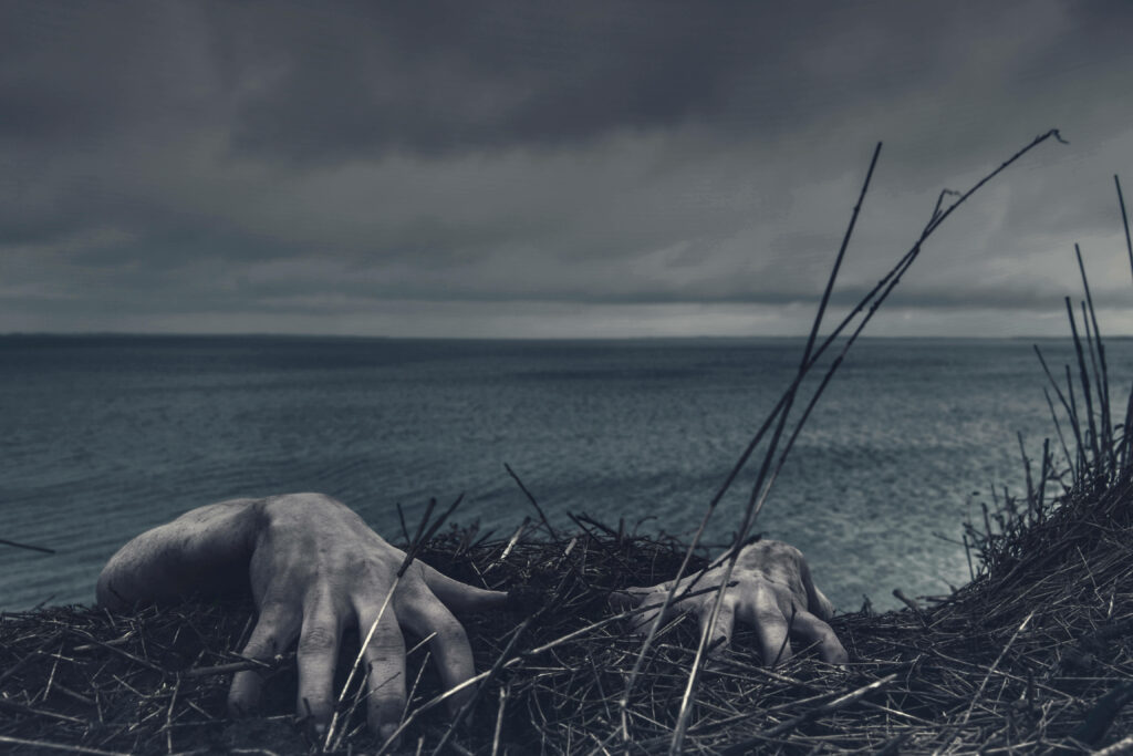 Dark anime wallpaper with ghostly hands rising from stormy shoreline paranormal scene