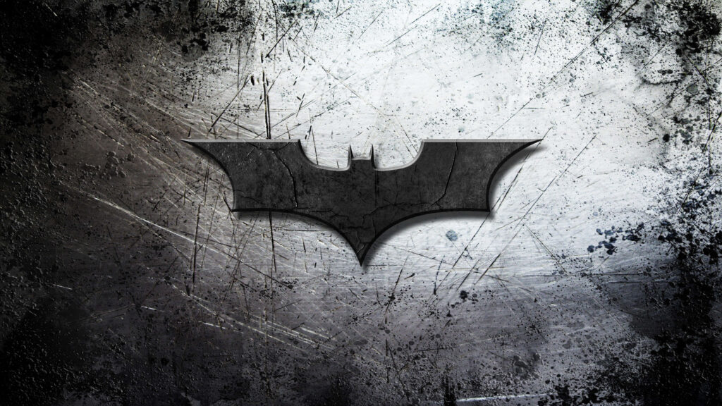 Striking Batman logo shadow on rugged textured background dark knight wallpaper fan art