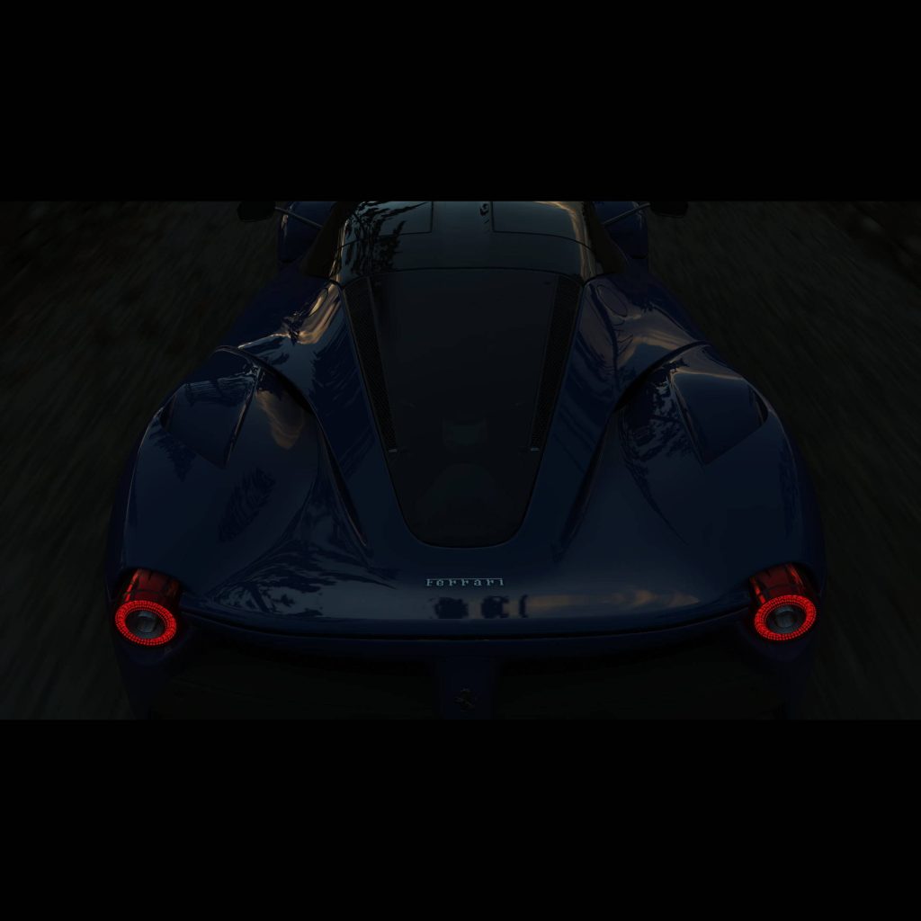 Dark blue Ferrari LaFerrari rear view with motion blur glowing tail lights Forza Horizon 4 wallpaper