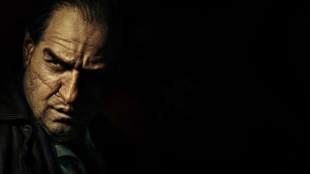 Dark Wallpaper of Colin Farrell as The Penguin | Intense Portrait