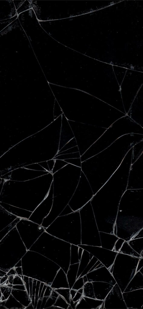Realistic shattered glass dark screen wallpaper with intricate white cracks and broken lines background