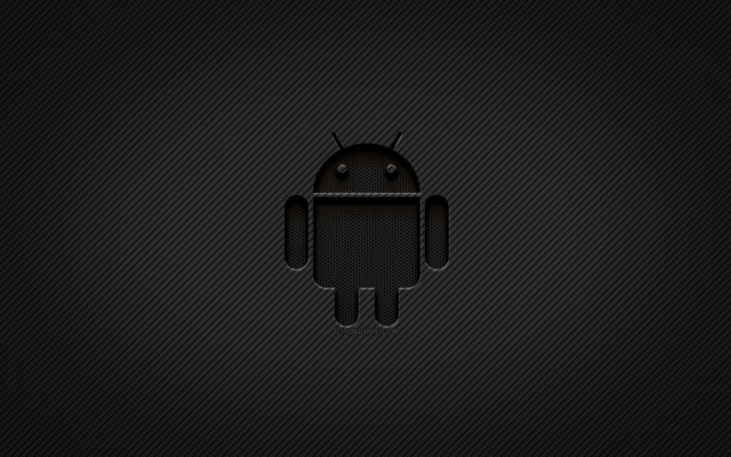 Darkly Captivating: Android Grid Logo Shining Amidst Black Patterns on Desktop Wallpaper
