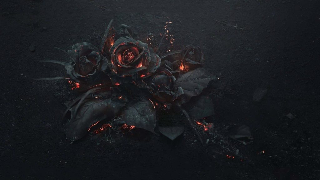 Dark Gothic wallpaper with glowing orange ember charcoal roses for moody elegant background
