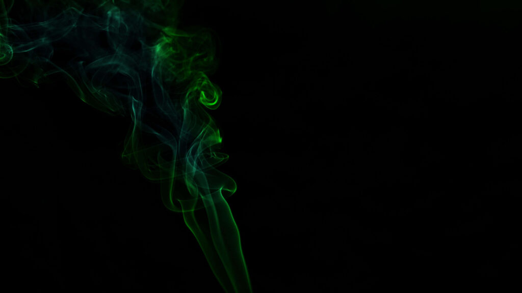 Ethereal Dark Background with Green Smoke Wisps - Mystical Wallpaper