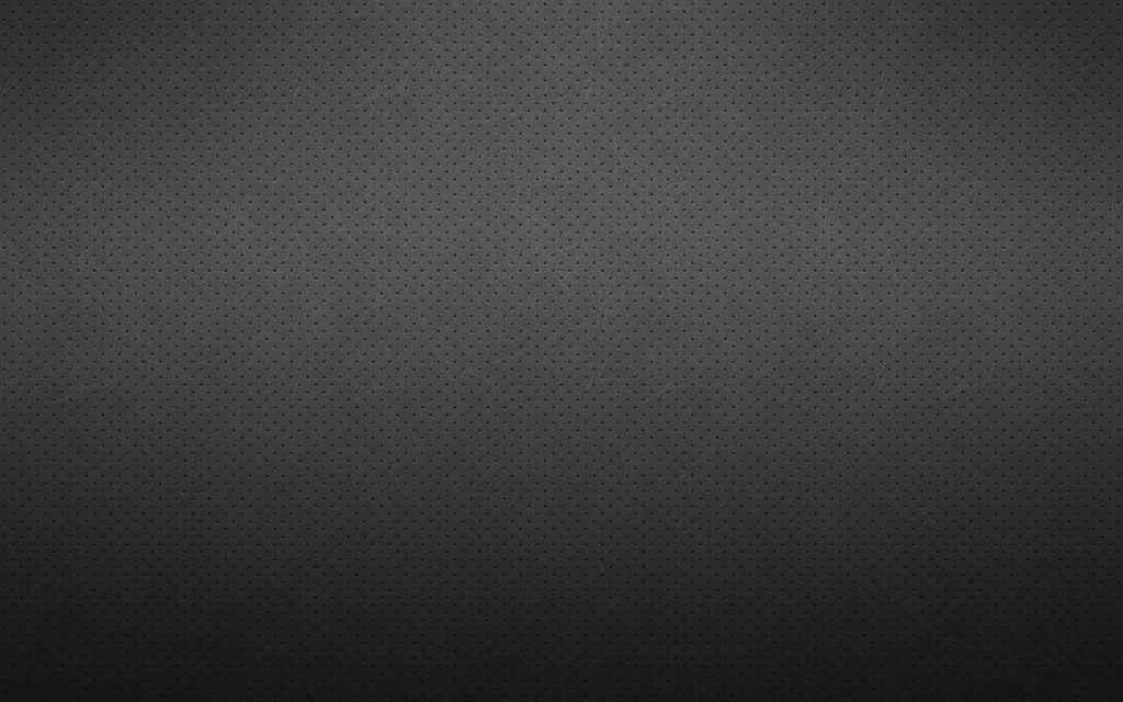 Dark grey perforated leather wallpaper with minimalist grid and subtle vignette texture