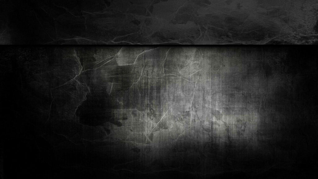 Moody Dark Grunge Wallpaper with Rugged Texture and Subtle Highlights