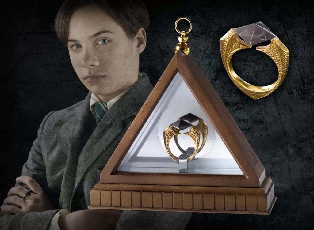 Dark Harry Potter wallpaper with young Tom Riddle in Hogwarts robes and Marvolo Gaunt’s ring display