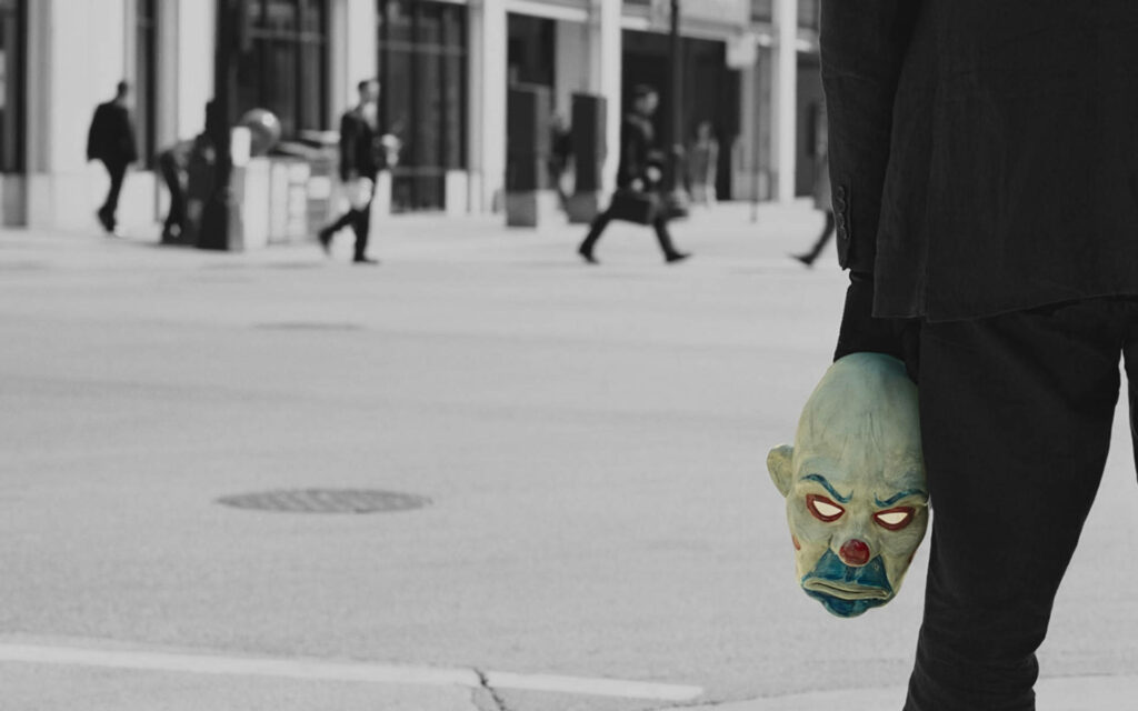 Intense Street Scene Wallpaper: Dark Joker Mask Vibe