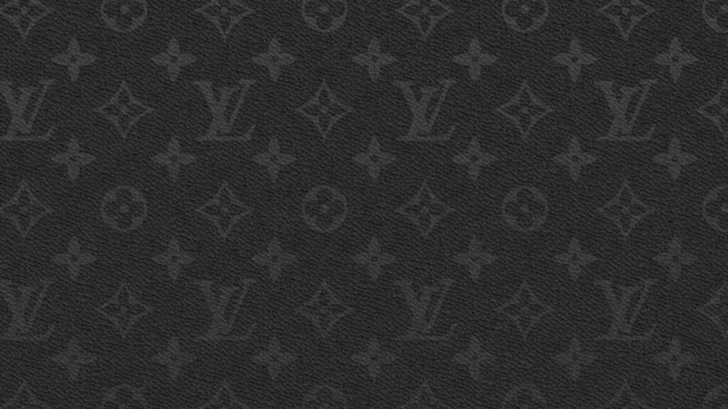 Dark Louis Vuitton monogram wallpaper with textured black background for luxury aesthetic design