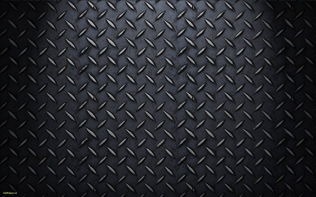 Dark metallic diamond plate wallpaper with industrial tread pattern and dramatic lighting texture