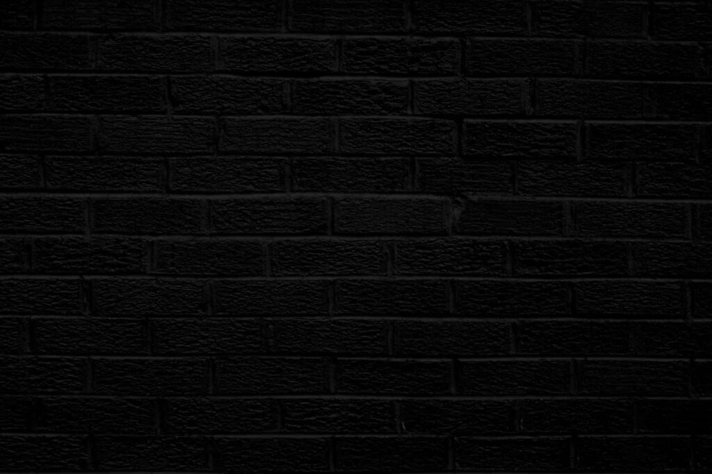 Modern Black Brick Wallpaper: Sleek Minimalist Background Texture