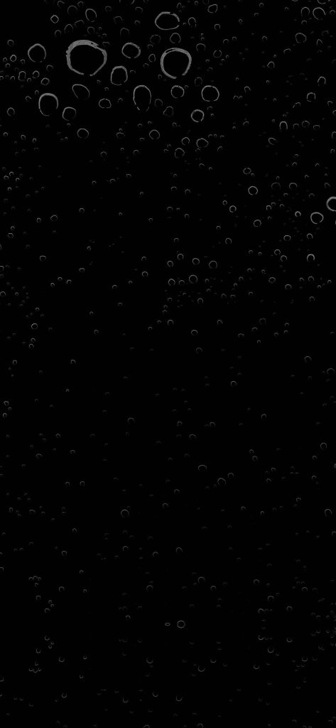 Dark mode mobile wallpaper with minimalist air bubbles on black OLED-friendly background