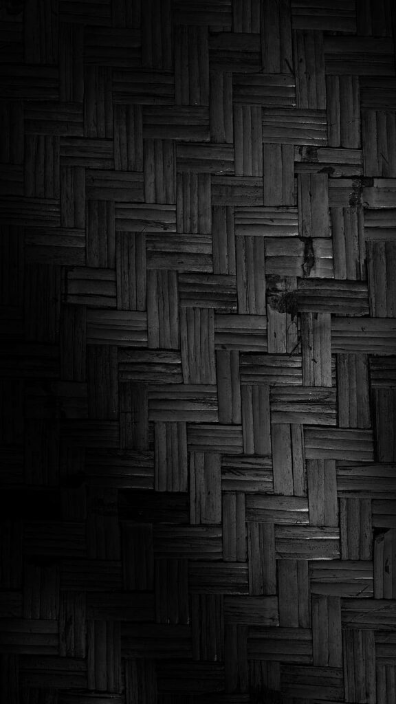 Bold Black Tiled Wallpaper: Intricate Woven Pattern Background
