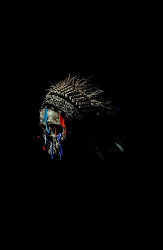 Dark skull with Native American headdress and red blue paint drips on black iPhone wallpaper